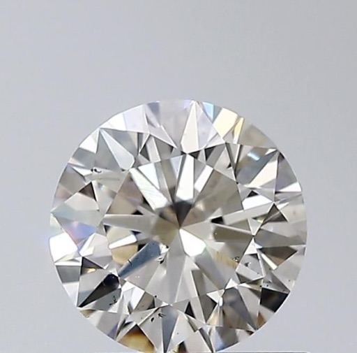 0.70 ct Round K · Faint Brown natural diamond
