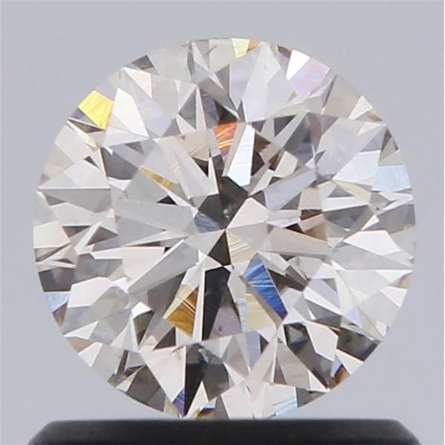 0.77 ct Round N · Very Light Brown natural diamond
