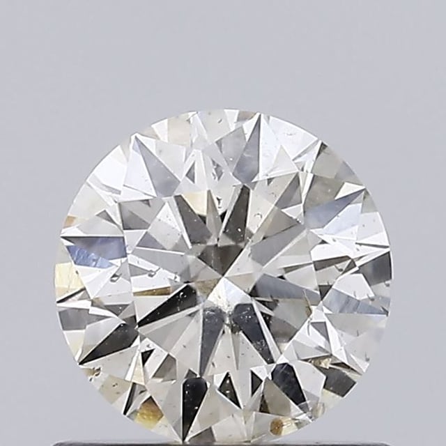 0.60 ct Round N · Very Light Brown natural diamond