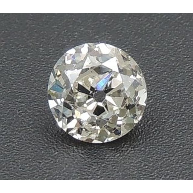 0.73 ct Round L · Faint Brown natural diamond