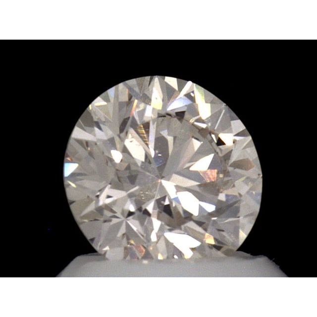 1.01 ct Round M · Faint Brown natural diamond