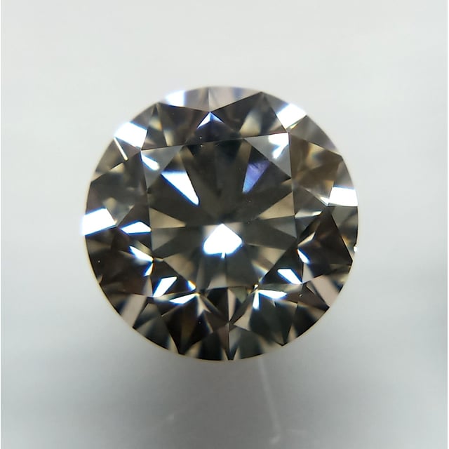 0.71 ct Round L · Faint Brown natural diamond