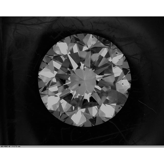 0.72 ct Round M · Faint Brown natural diamond