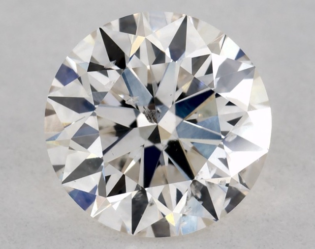 0.70 ct Round K · Faint Brown natural diamond