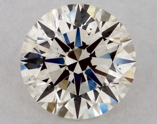 0.70 ct Round K · Faint Brown natural diamond