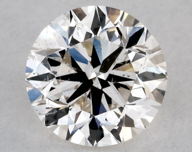 0.70 ct Round K · Faint Brown natural diamond