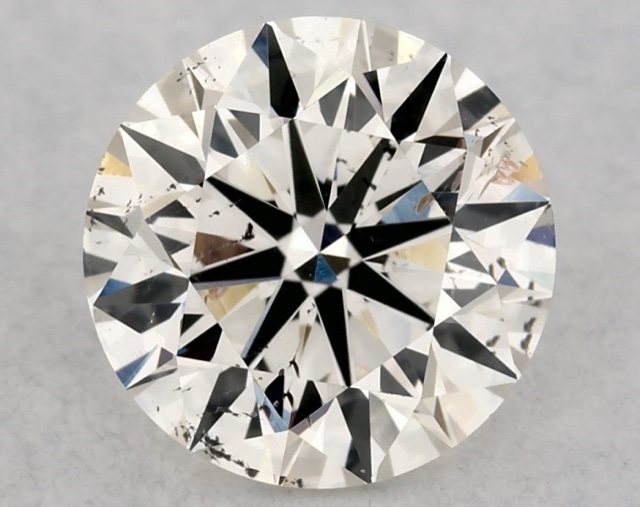 0.90 ct Round K · Faint Brown natural diamond