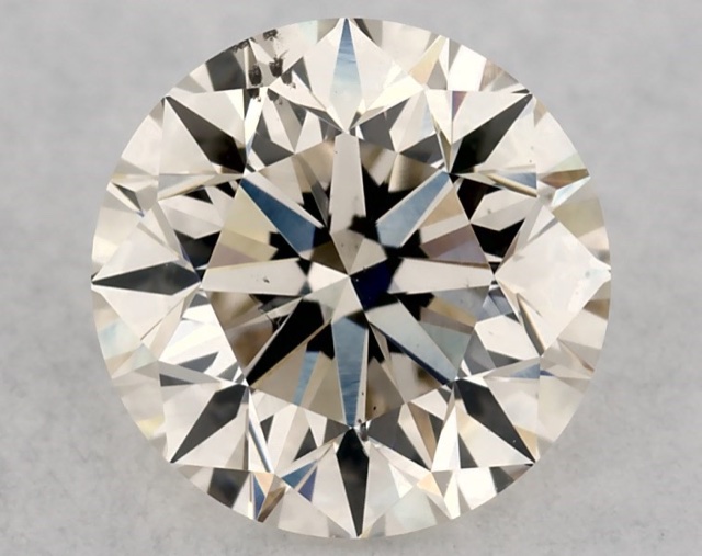 0.90 ct Round K · Faint Brown natural diamond