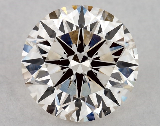 0.73 ct Round K · Faint Brown natural diamond