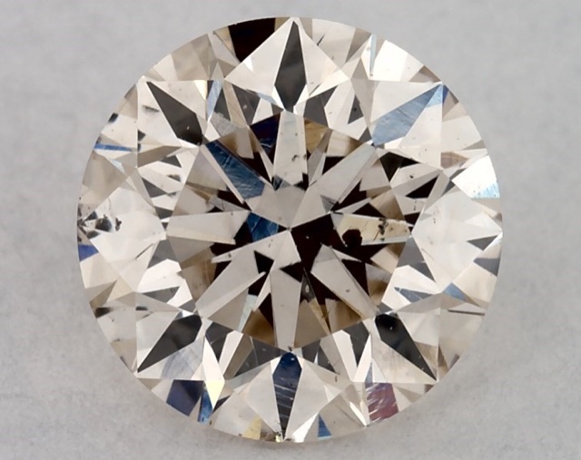 0.70 ct Round K · Faint Brown natural diamond