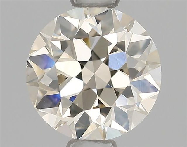 0.70 ct Round M · Faint Brown natural diamond