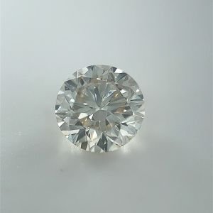 0.90 ct Round M · Faint Brown natural diamond