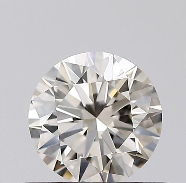 0.52 ct Round M · Faint Brown natural diamond