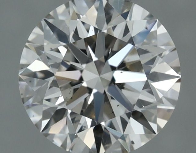 0.57 ct Round K · Faint Brown natural diamond