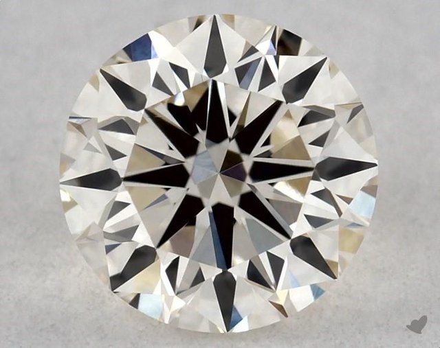 0.40 ct Round K · Faint Brown natural diamond