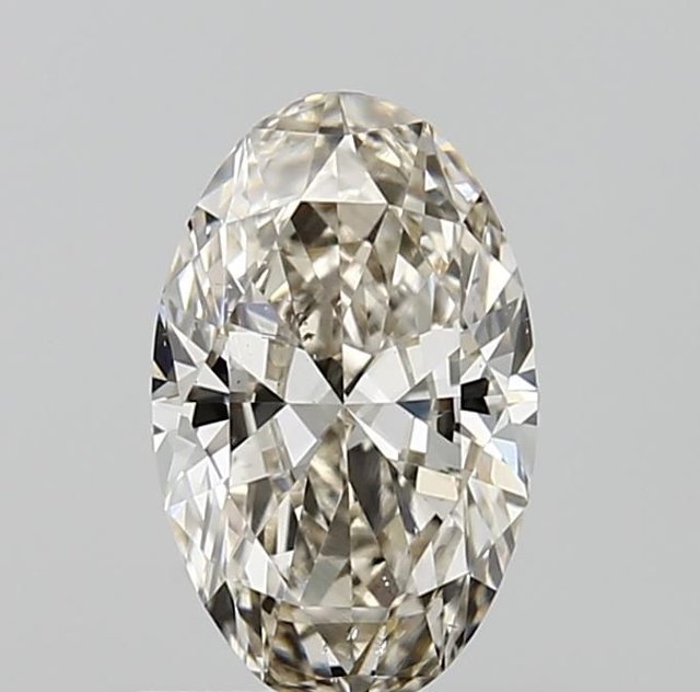 0.61 ct Oval M · Faint Brown natural diamond