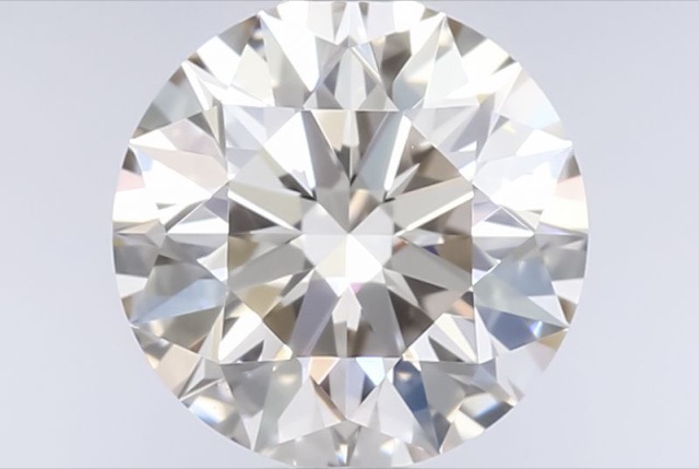 1.03 ct Round M · Faint Brown natural diamond