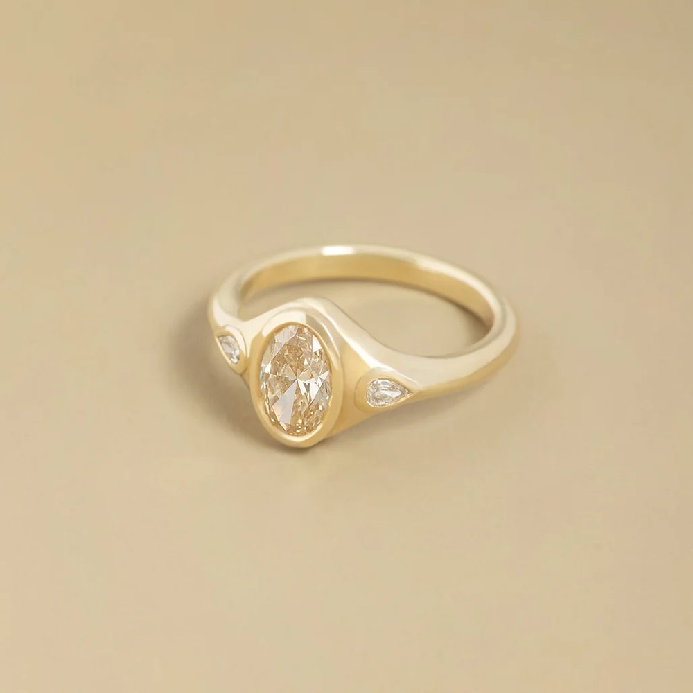 Shanti Curvy Champagne Oval Engagement Ring
