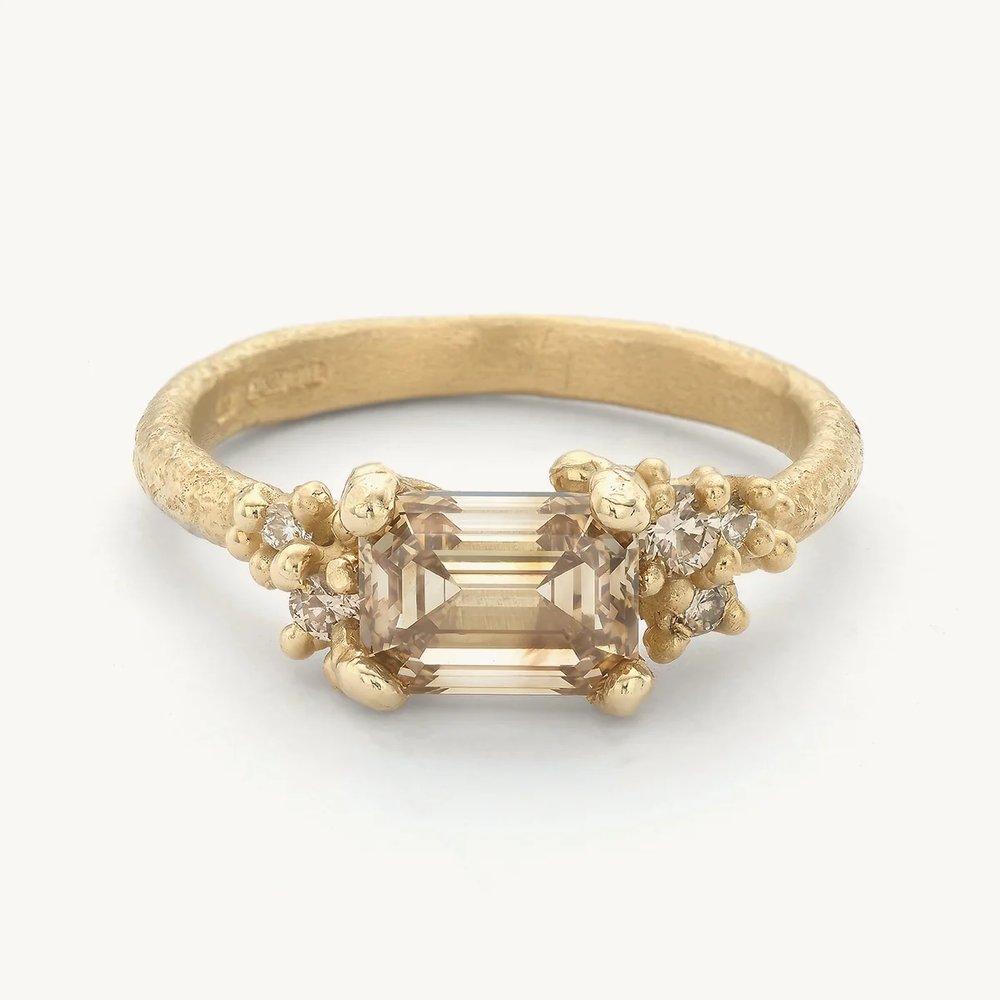 Encrusted Emerald Cut Champagne Diamond Ring